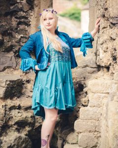 Teal bustle jacket